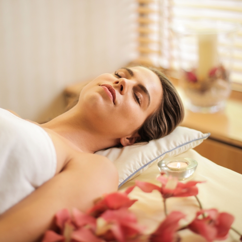 Serene spa room with a single massage table
